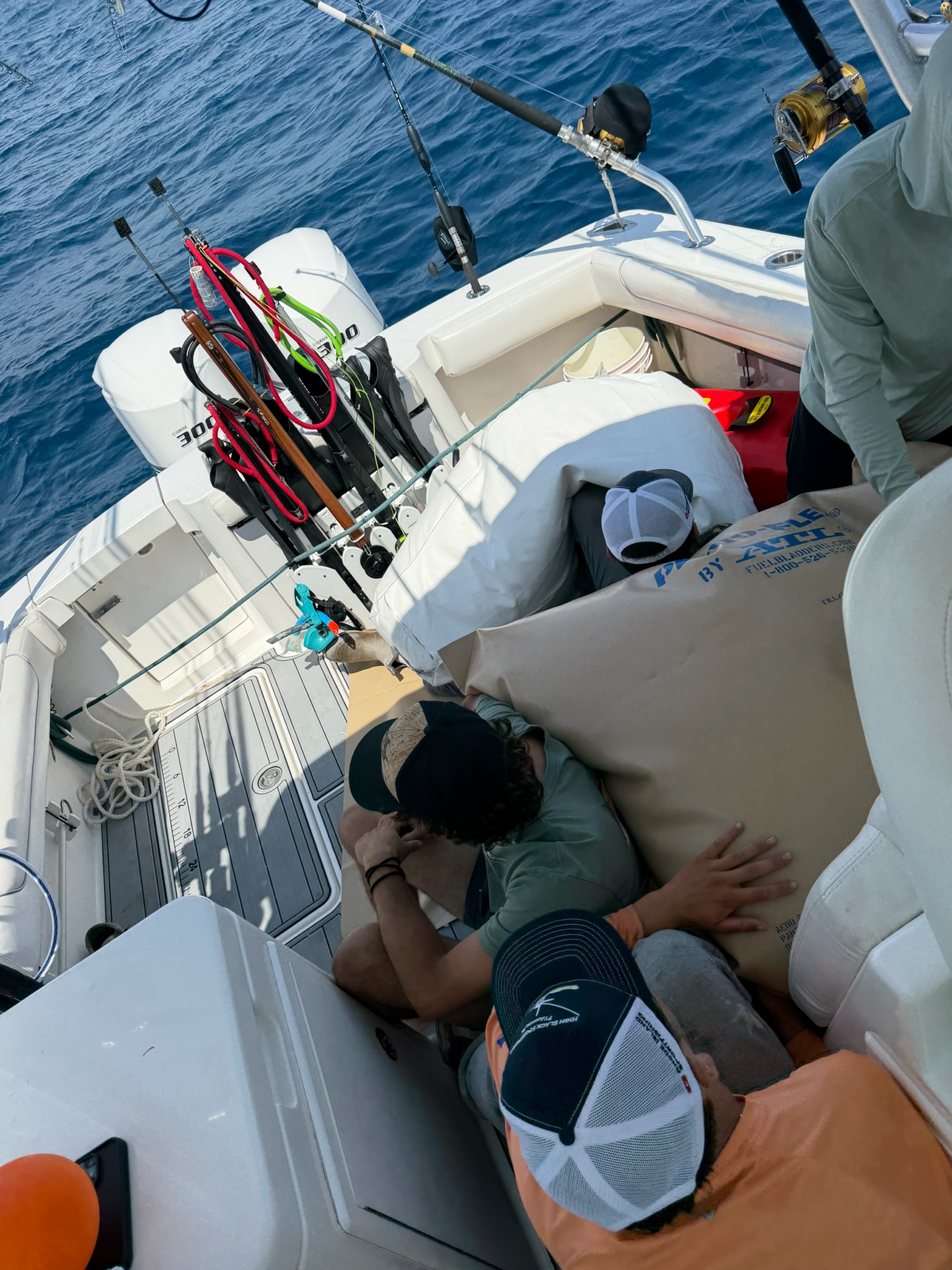 Crew napping on deck during offshore trip